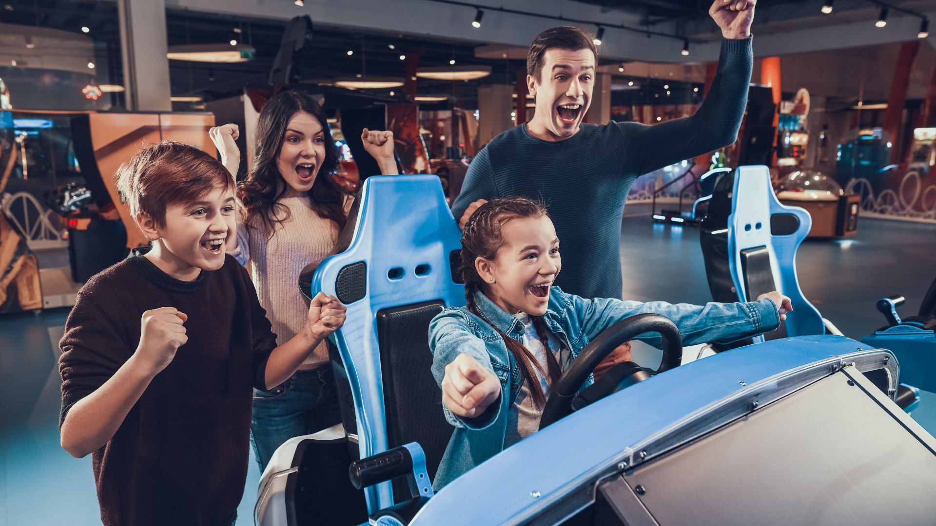 family playing arcade games